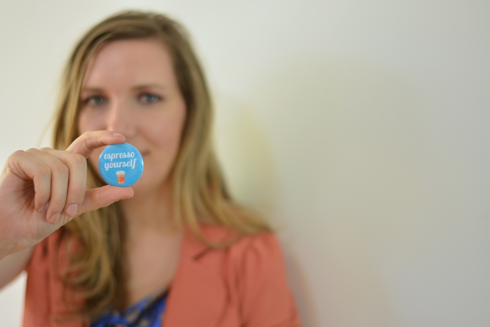 Woman holding badge